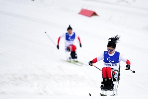 Yang conquista il secondo oro di sci di fondo sprint seduta, decimo per la Cina alle Paralimpiadi Invernali di Beijing